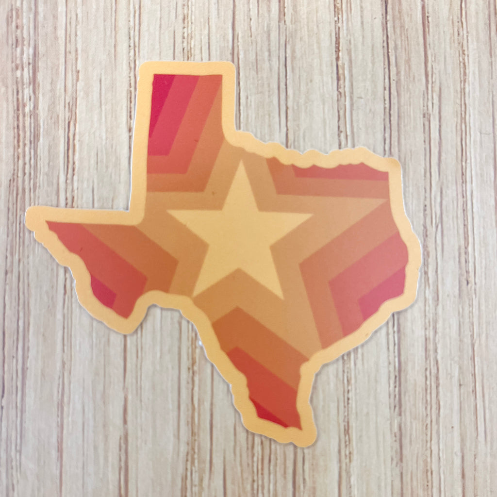 Texas Shaped Orange Star Sticker - Lyla's: Clothing, Decor & More - Plano Boutique