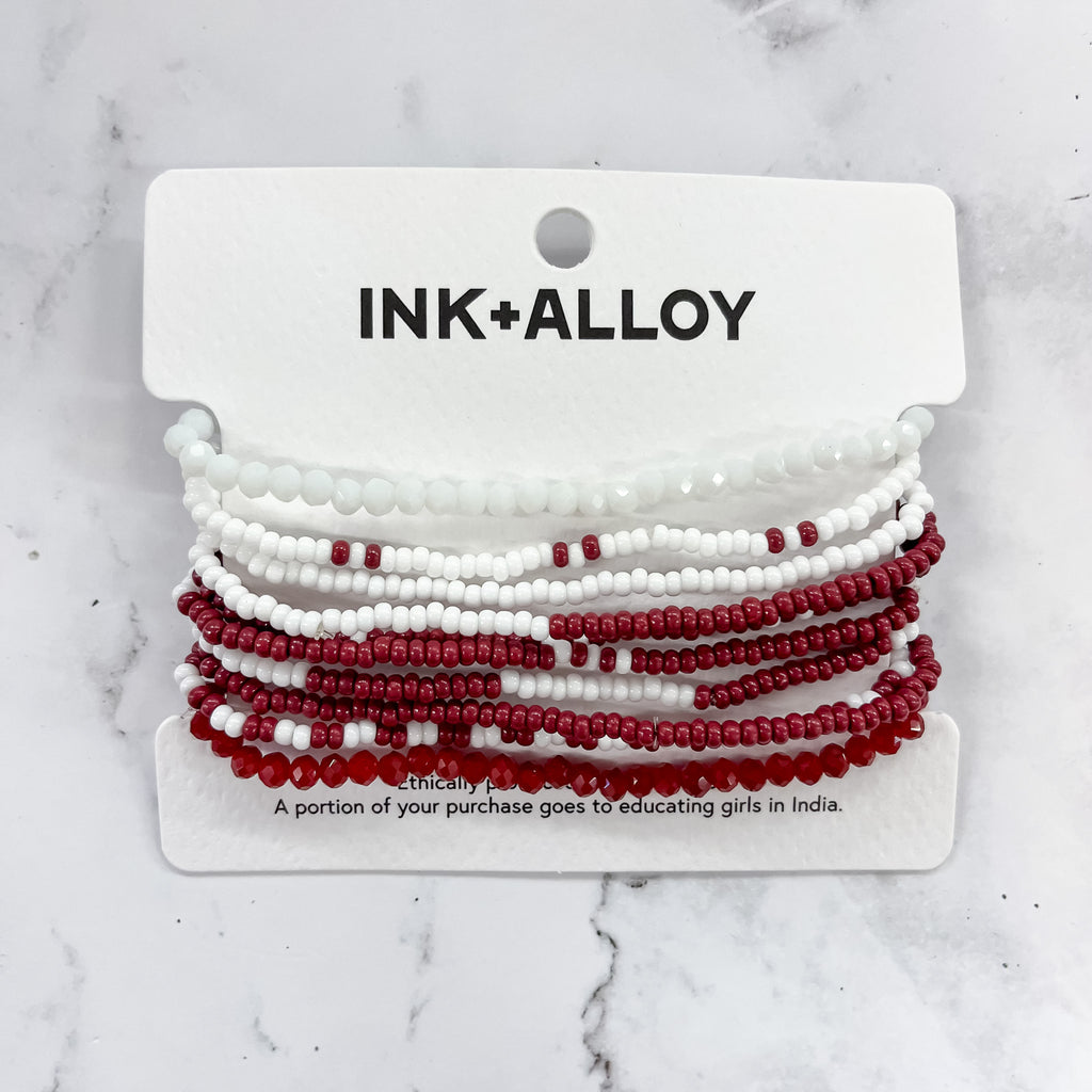 Sage Color Block Beaded 10 Strand Stretch Bracelets Maroon and White by Ink & Alloy - Lyla's: Clothing, Decor & More - Plano Boutique