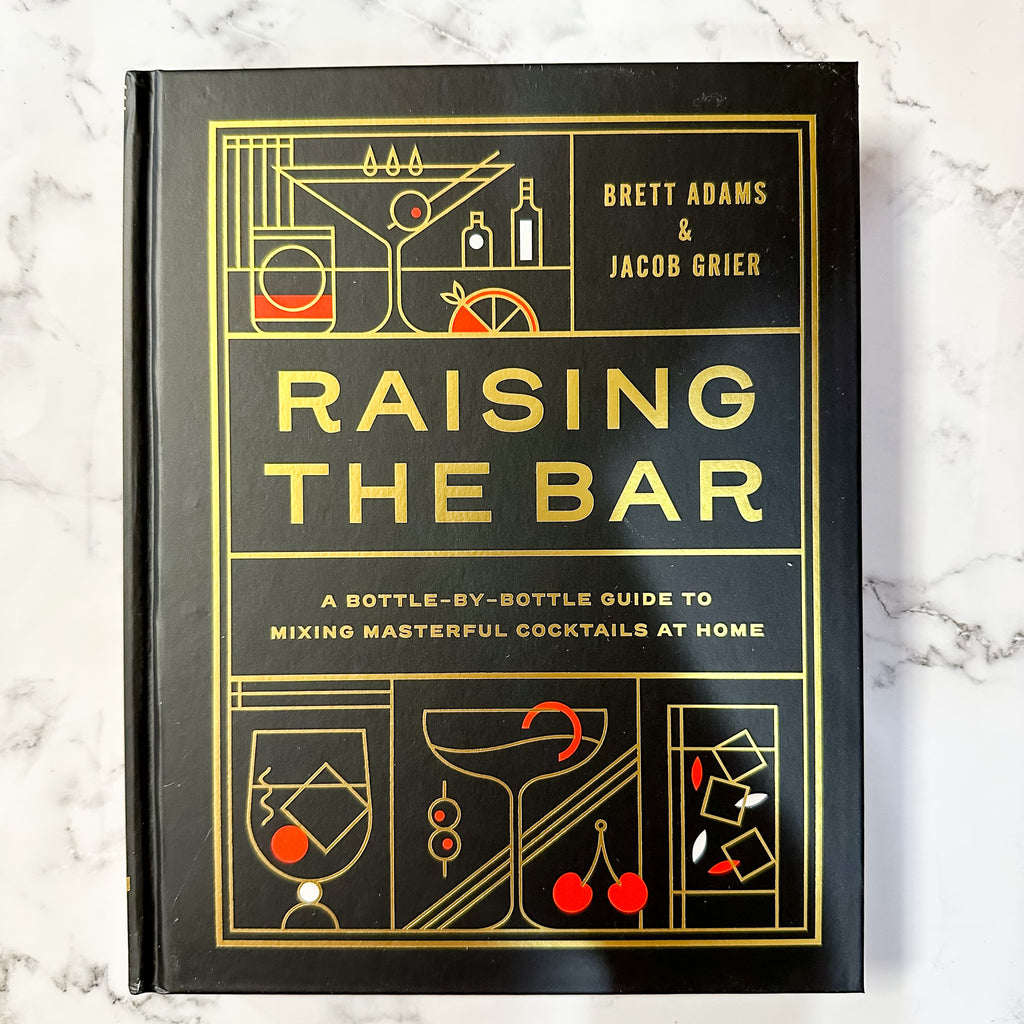 Raising the Bar A Bottle-by-Bottle Guide to Mixing Masterful Cocktails at Home - Lyla's: Clothing, Decor & More - Plano Boutique