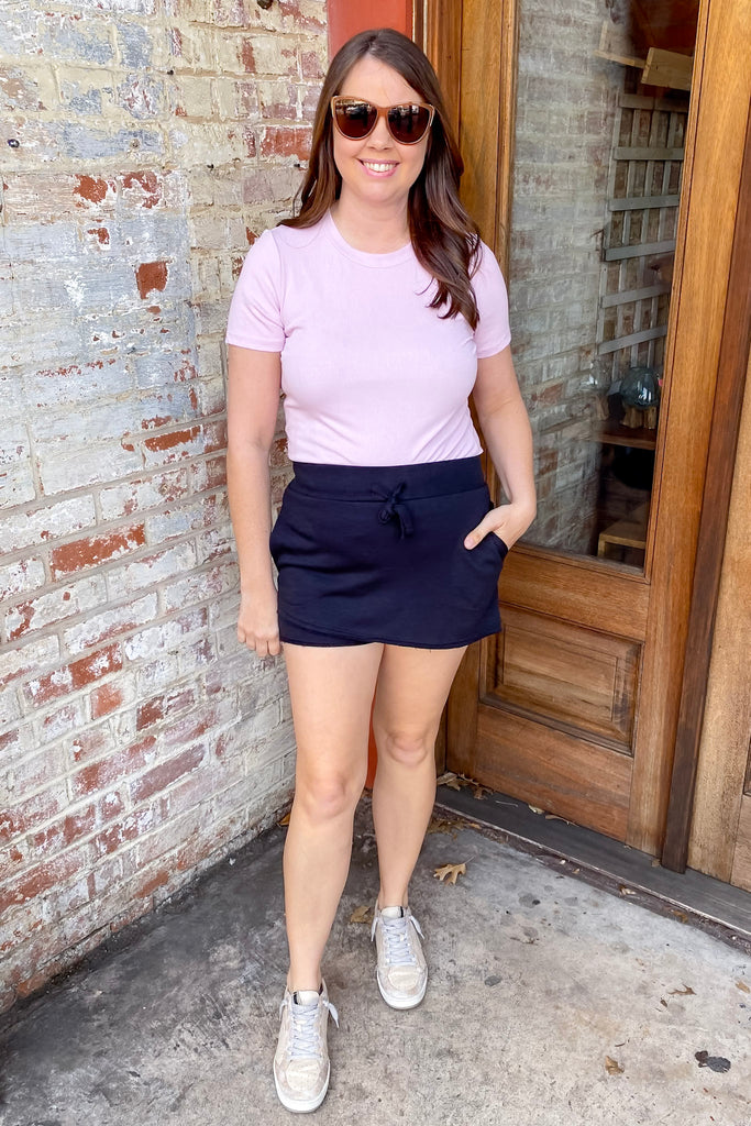 Athleisure Assymetrical Raw Hem Black Skort - Lyla's: Clothing, Decor & More - Plano Boutique