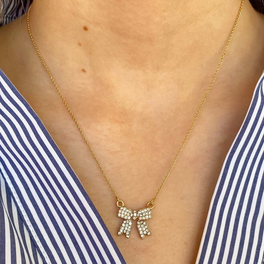 Dora Bow Gold Necklace By Meghan Browne - Lyla's: Clothing, Decor & More - Plano Boutique
