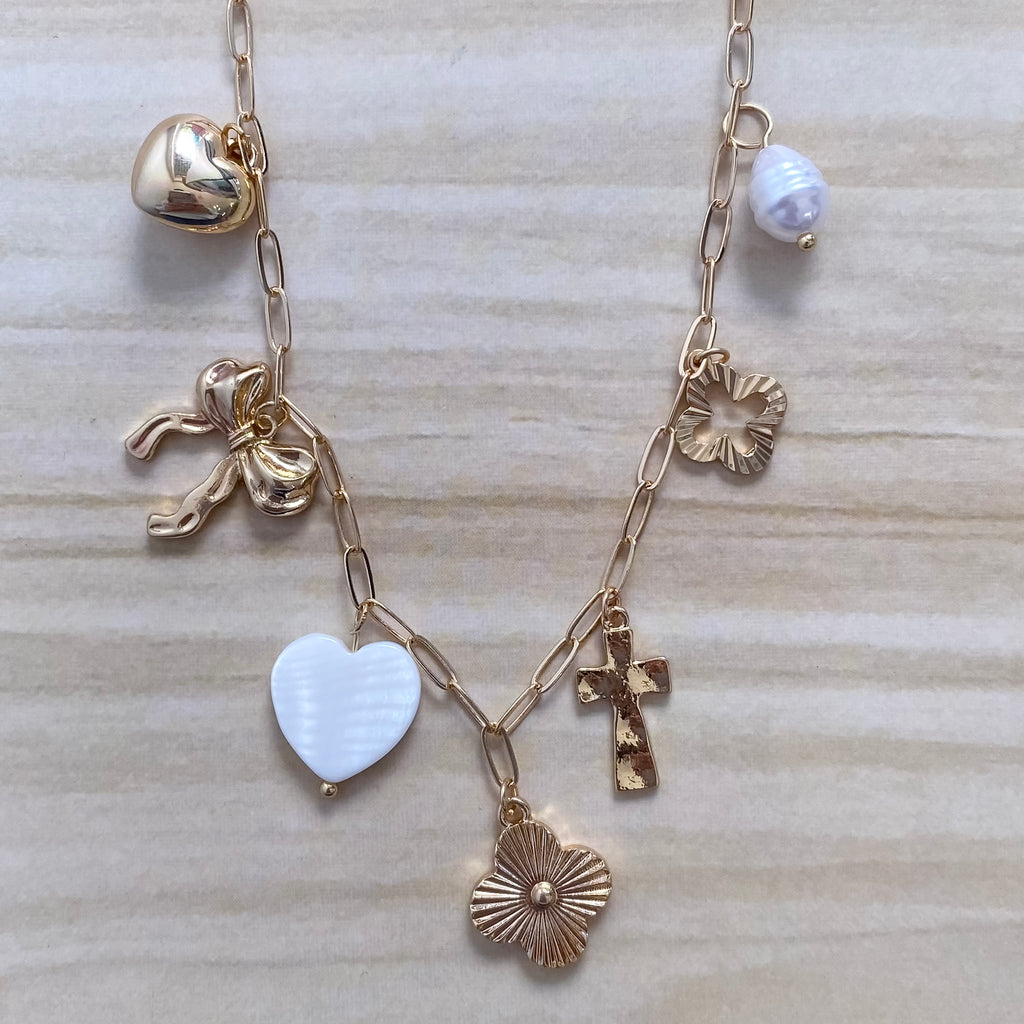Gold And White Assorted Charm Necklace - Lyla's: Clothing, Decor & More - Plano Boutique