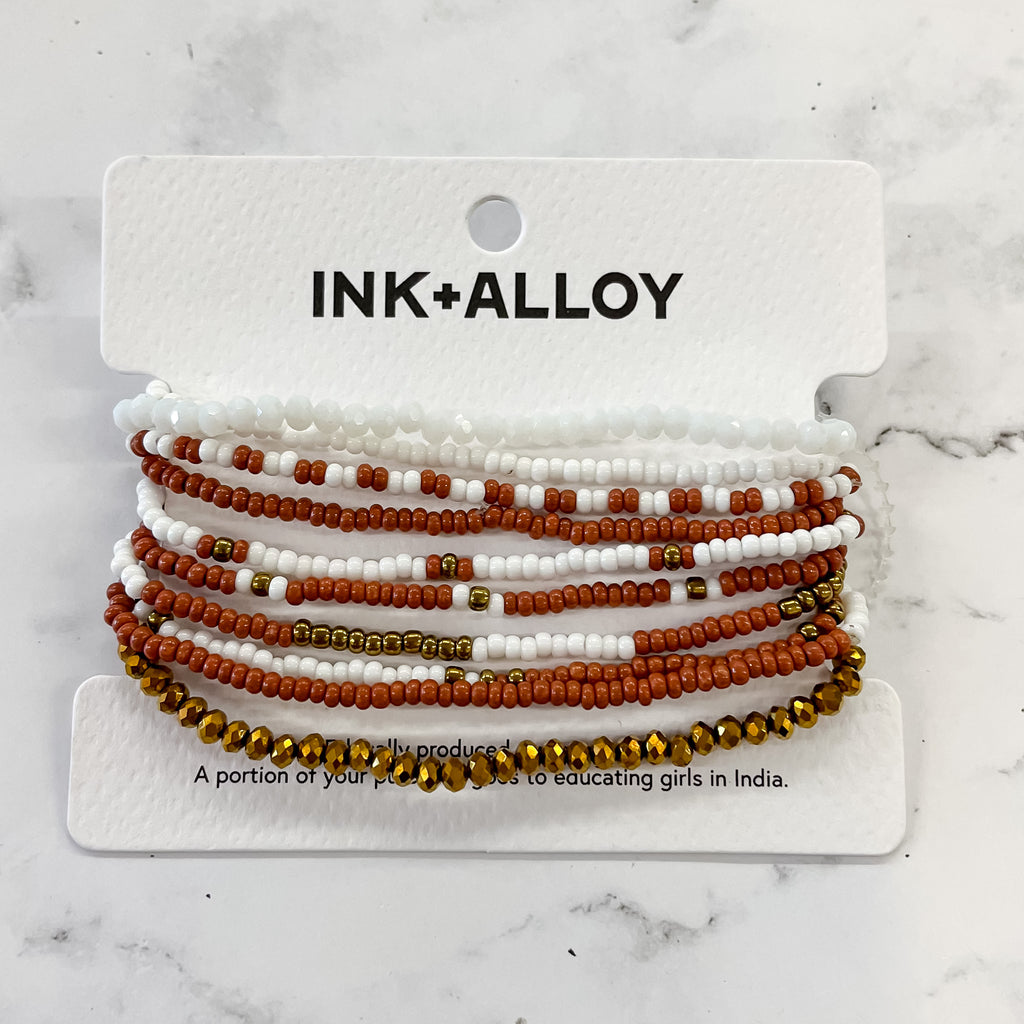 Sage Color Block Beaded 10 Strand Stretch Bracelets Rust & White by Ink & Alloy - Lyla's: Clothing, Decor & More - Plano Boutique