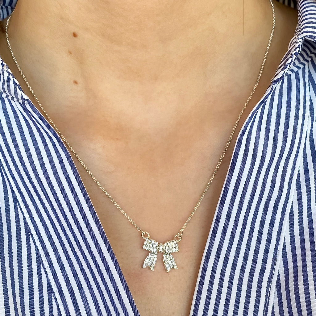 Dora Bow Silver Necklace By Meghan Browne - Lyla's: Clothing, Decor & More - Plano Boutique