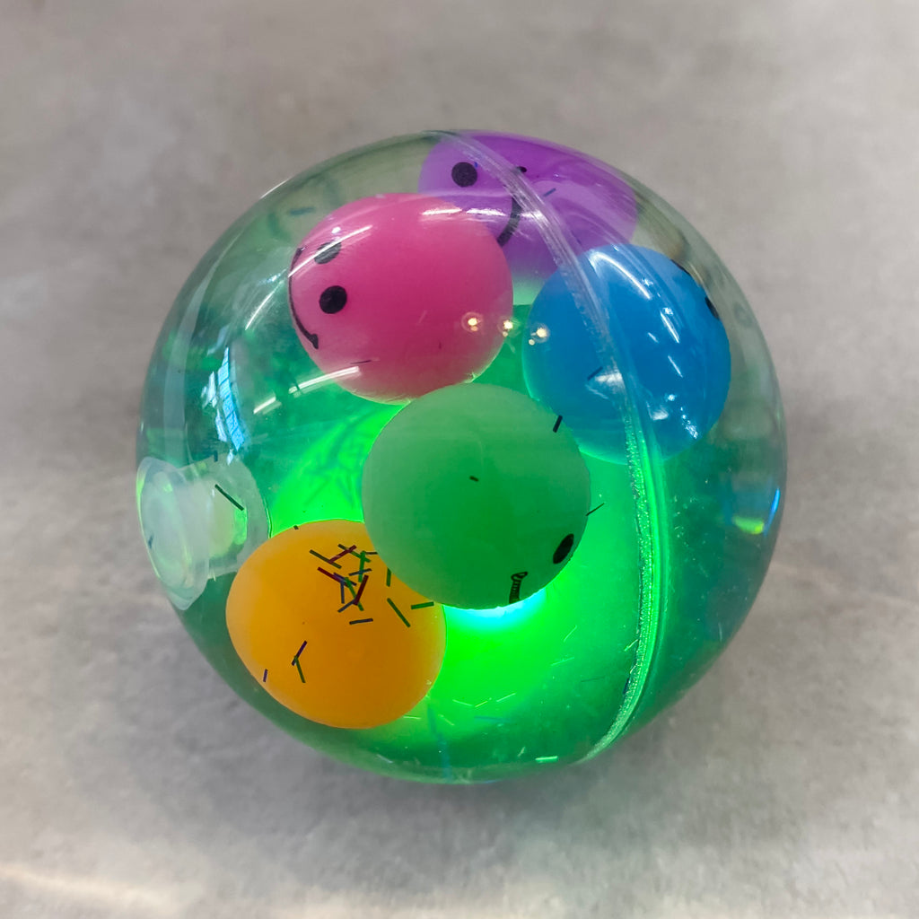 LED Glitter Bouncing Ball - Lyla's: Clothing, Decor & More - Plano Boutique