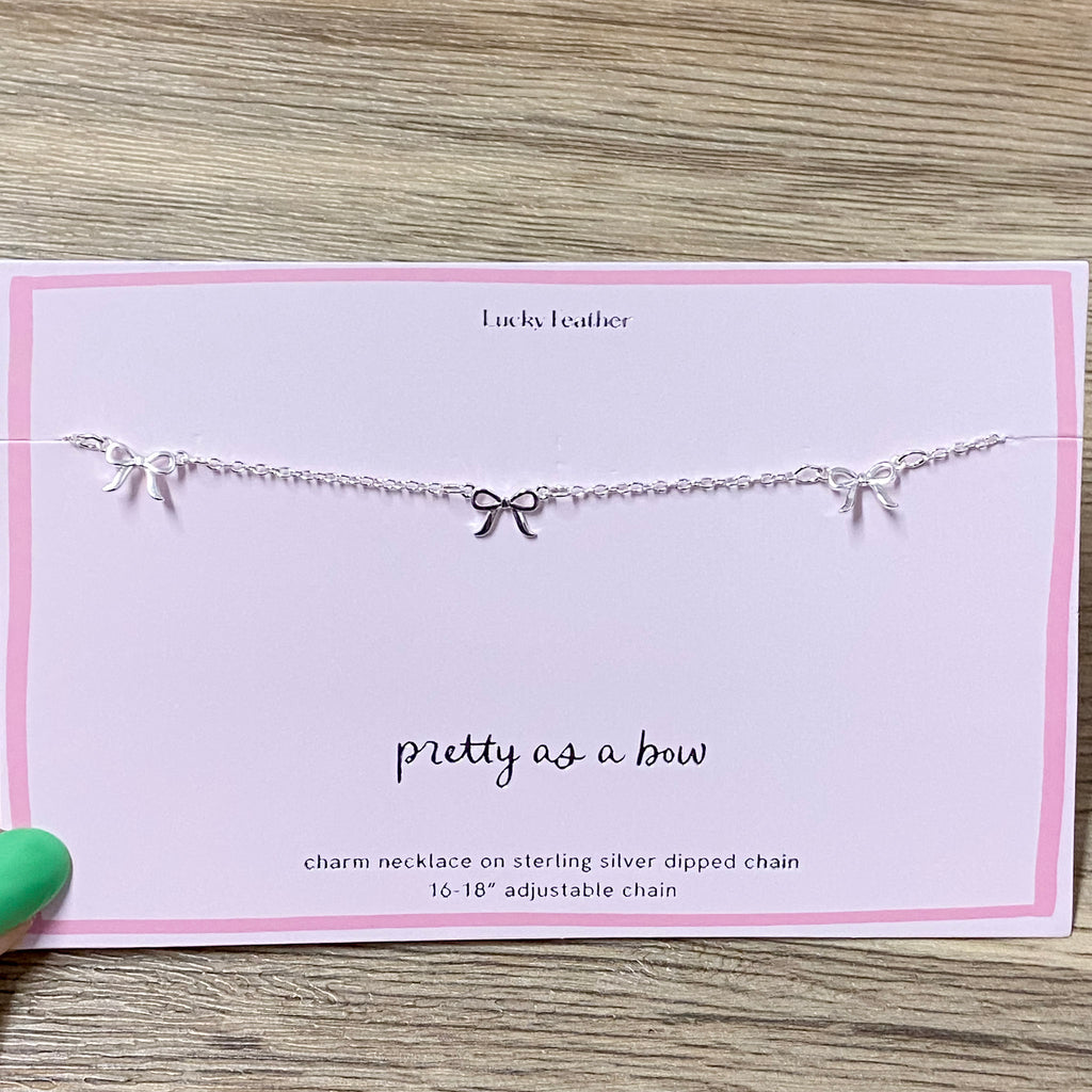 Beautiful Bow Trio Charm Silver Necklace - Lyla's: Clothing, Decor & More - Plano Boutique