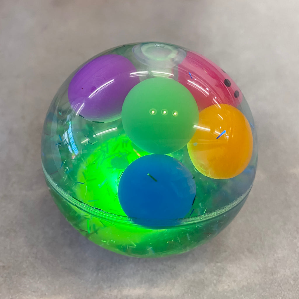 LED Glitter Bouncing Ball - Lyla's: Clothing, Decor & More - Plano Boutique