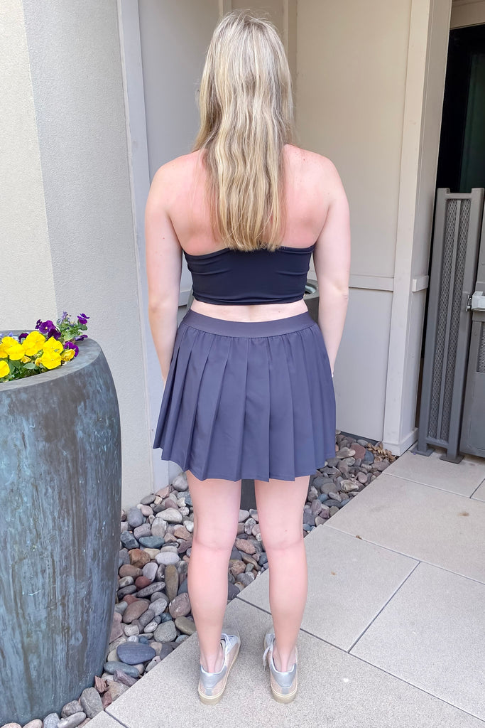 Athleisure Pleat Charcoal Tennis Skort - Lyla's: Clothing, Decor & More - Plano Boutique