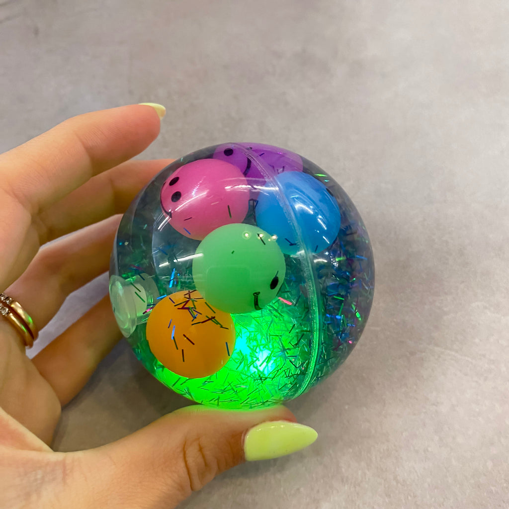 LED Glitter Bouncing Ball - Lyla's: Clothing, Decor & More - Plano Boutique