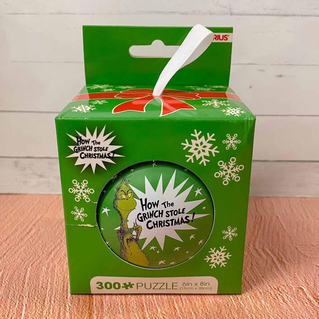 How The Grinch Stole Christmas 300 Piece Jigsaw Puzzle in Tin Globe - Lyla's: Clothing, Decor & More - Plano Boutique