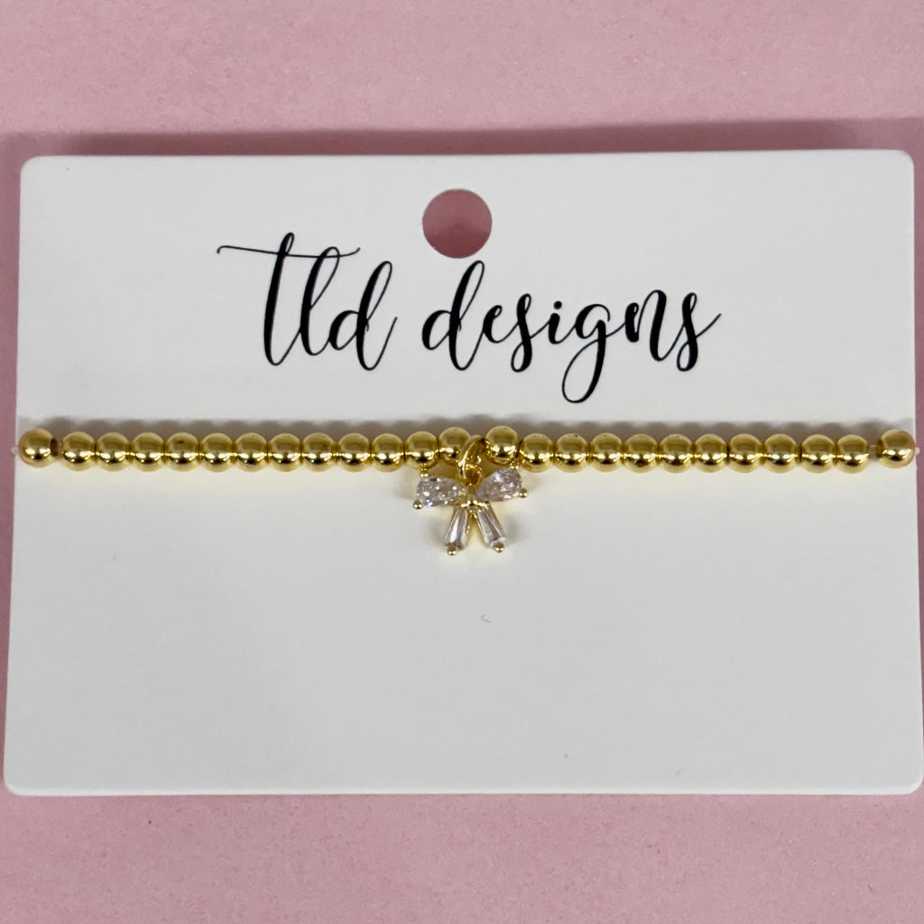 Cute Bow Bracelets - Lyla's: Clothing, Decor & More - Plano Boutique