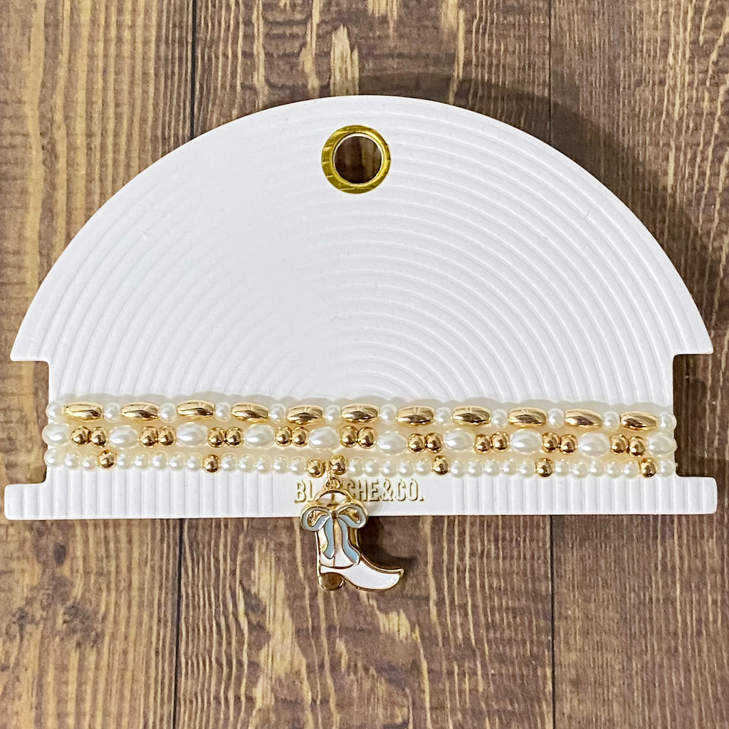 Set Of Three Gold And Pearl Stretch Bracelets With Boot - Lyla's: Clothing, Decor & More - Plano Boutique