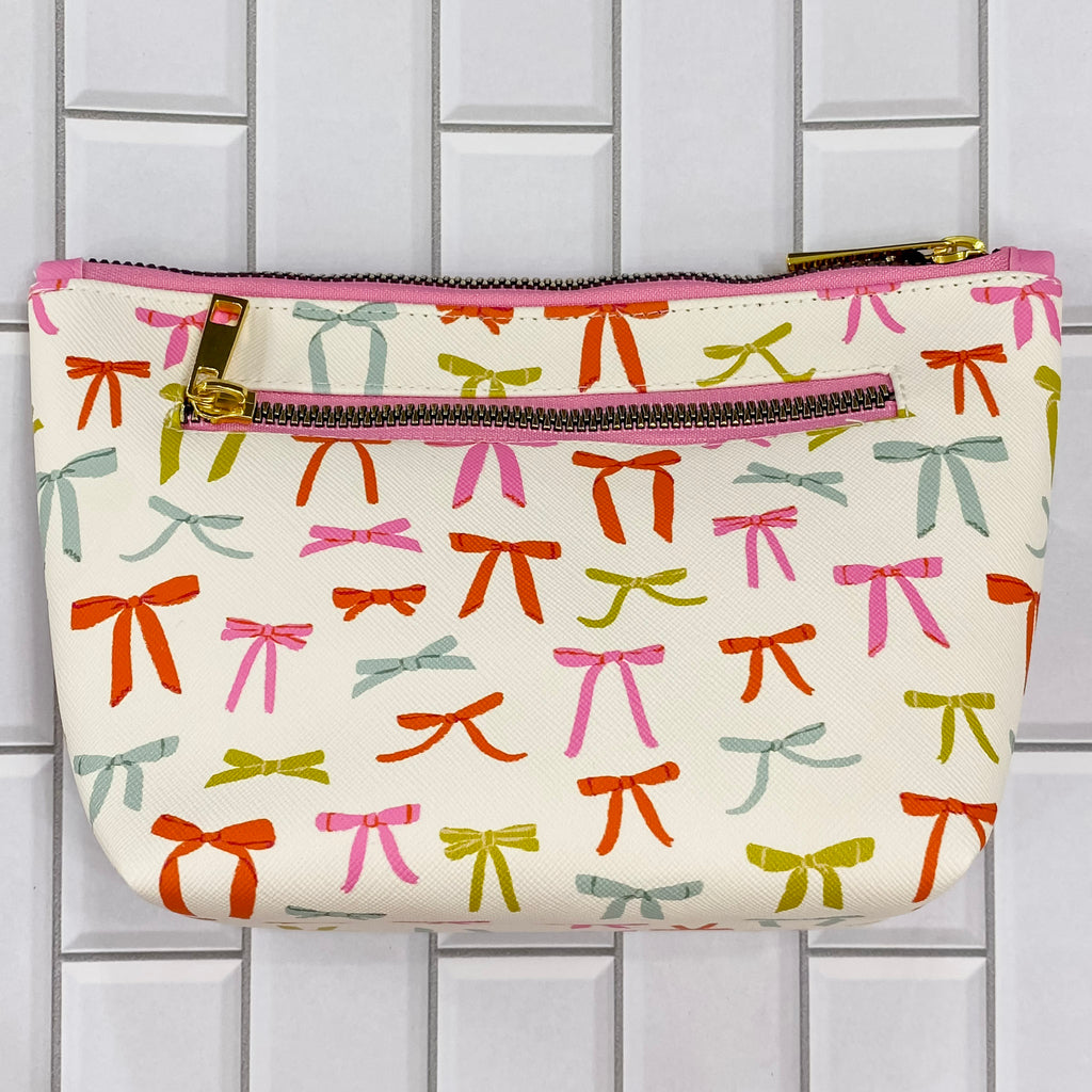 Put a Bow on It Clutch Cosmetic Bag - Lyla's: Clothing, Decor & More - Plano Boutique
