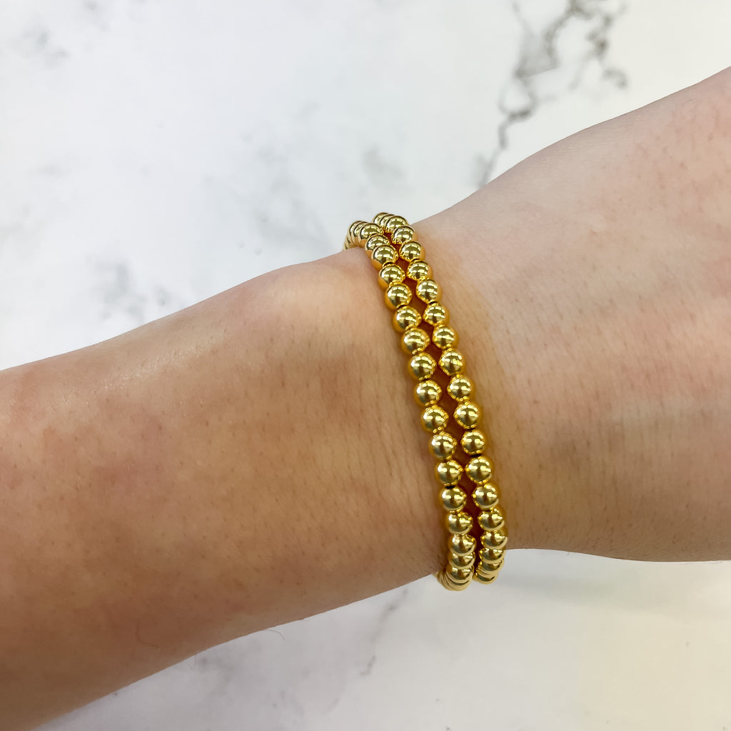 Gold 4mm Stack Bracelet by Splendid Iris - Lyla's: Clothing, Decor & More - Plano Boutique