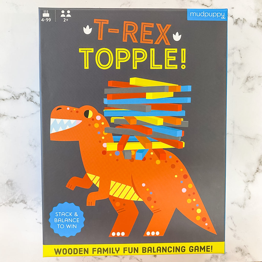 T-Rex Topple! Balancing Game - Lyla's: Clothing, Decor & More - Plano Boutique